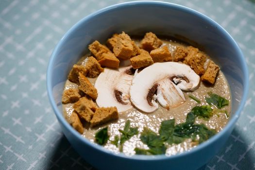 Mushroom soup puree with breadcrumbs and herbs