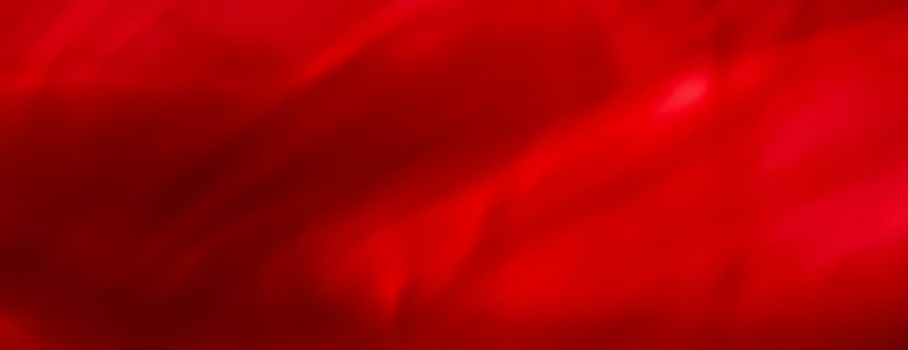 Holiday branding, beauty glamour and love backgrounds concept - Red abstract art background, silk texture and wave lines in motion for classic luxury design