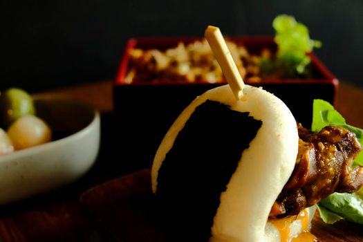 Hirata buns.  Japanese steamed buns filled with pork chashu, tempura, karaage. Japanese traditional food