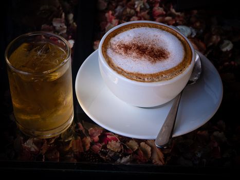Top view White cup of Cappuccino Latte coffee on nature background.