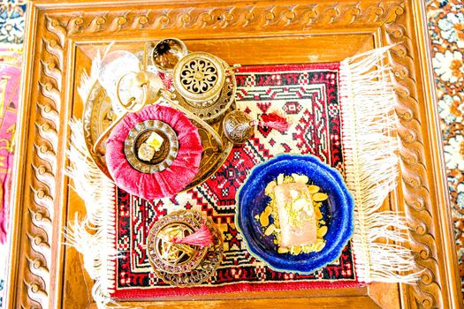 Turkish coffee and tea set in colorful traditional housewares with ice cream in Turkish theme coffee cafe