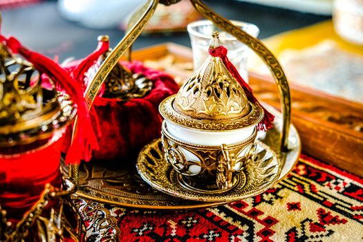 Turkish coffee and tea set in colorful traditional housewares in Turkish theme coffee cafe