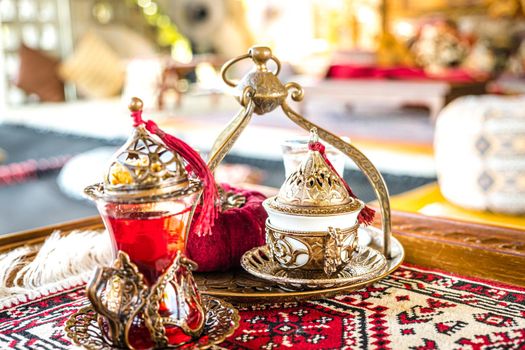 Turkish coffee and tea set in colorful traditional housewares in Turkish theme coffee cafe