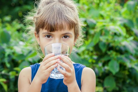 child glass of water. selective focus. Children