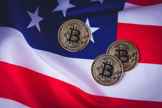 Bitcoins in the USA. Cryptocurrency ban in America. The growth of the exchange rate. Usa flag and bitcoin coin.