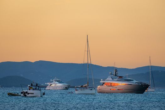 Yachts anchored in Formentera with the reflection of the sun