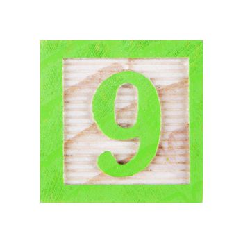 A Number 9 nine childs wood block on white with clipping path