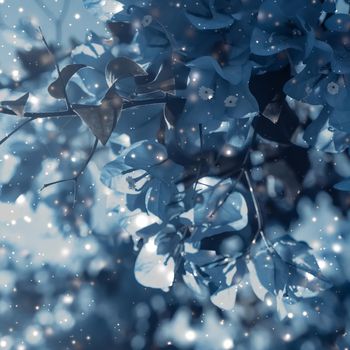 Magical, branding and festive concept - Christmas, New Years blue floral nature background, holiday card design, flower tree and snow glitter as winter season sale backdrop for luxury beauty brand