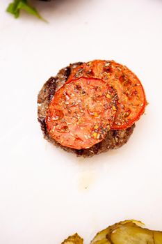 Chef preparing delicious burger meat. In restaurant