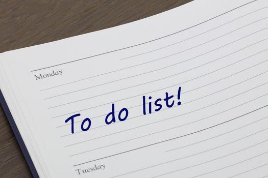 A To do list diary reminder open on desk