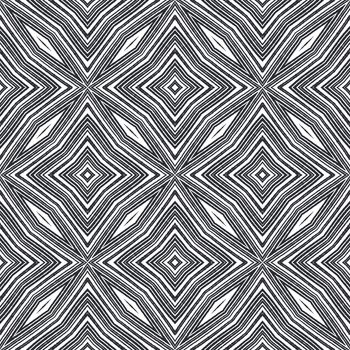 Chevron stripes design. Black symmetrical kaleidoscope background. Textile ready lively print, swimwear fabric, wallpaper, wrapping. Geometric chevron stripes pattern.