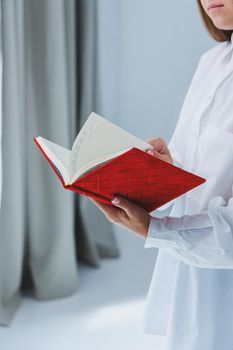 Red notebook for business notes. Women's case notebook