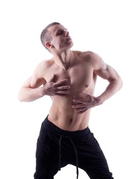 sexy young strong man posing in desire isolated