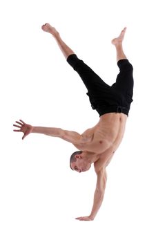 sexy young man posing nude stand on hand isolated