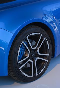 LE MANS, FRANCE - JUNE 18, 2017: Exposition or showroom of new french model sports car Alpine A110 Wheel Parts