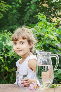 child glass of water. selective focus. Children