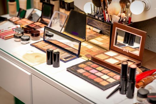 Set of decorative cosmetics on the table in a beauty salon