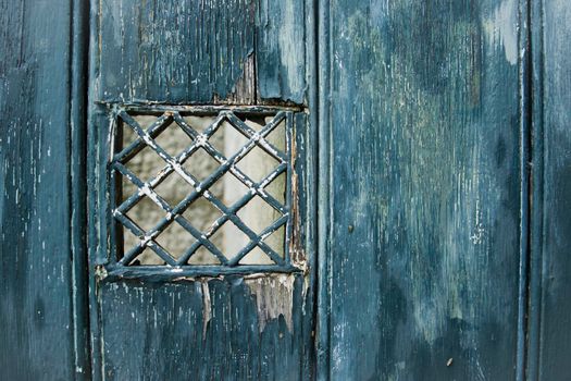 Emerald shabby door Cracked weathered wooden board texture