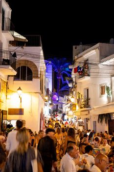 People moving in the square of Dalt Vila, Ibiza