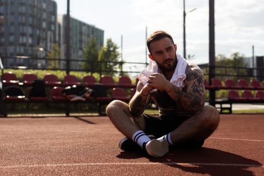 Man resting after training and cooling off