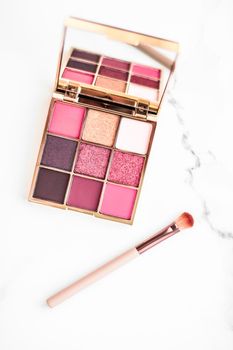 Cosmetic branding, fashion blog and glamour set concept - Eye shadow palette swatches on marble background, make-up and eyeshadows cosmetics product for luxury beauty brand and holiday flatlay design