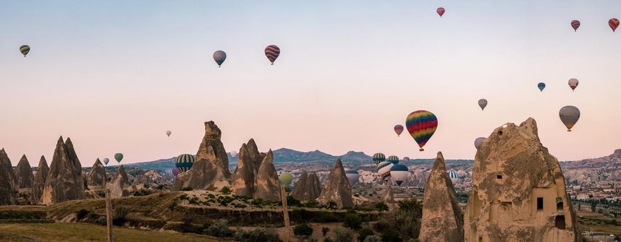 Sunrise with hot air balloons in Cappadocia, Turkey balloons in Cappadocia Goreme Kapadokya, and Sunrise in the mountains of Cappadocia.