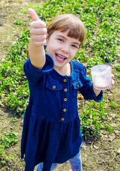 The child drinks milk. Selective focus. Kids.