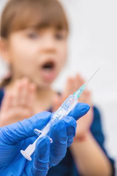 vaccination of children. An injection. Selective focus.