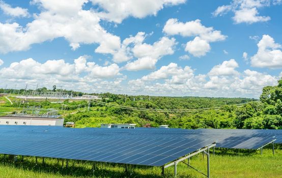 Photovoltaic power station or solar park. PV system. Solar farm and green field. Solar power for green energy. Photovoltaic power plant generate solar energy. Renewable energy. Sustainable resources.