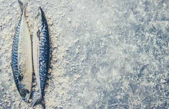 raw fish of mackerel. Selective focus. Food and drink.