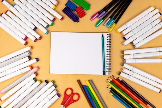 White notebook with a place for inscription on a yellow background.