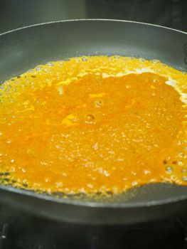 preparing autumn mushroom sauce for tagliatelle pasta- italian food