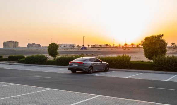 Shot of a car on the parking during sunset