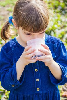 The child drinks milk. Selective focus. Kids.