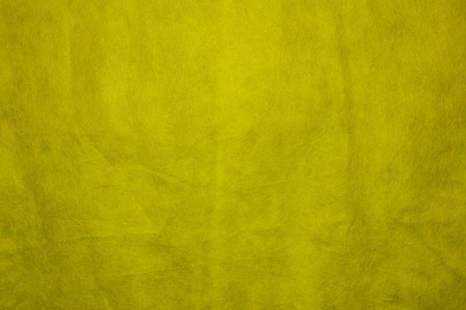 Fabric texture for design with copy space. Yellow abstract background with copy space.