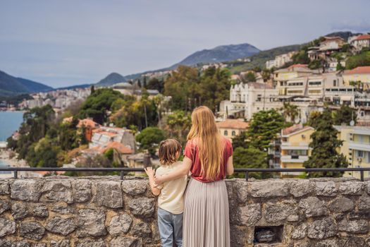 Mom and son tourists in Herceg Novi old town. Historical and touristic center of Herceg Novi. Montenegro.