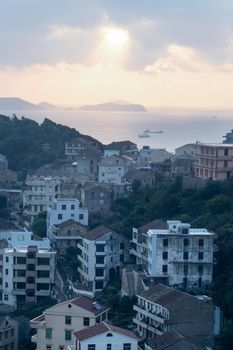 Seaside port with residental houses around, in Taizhou, Zhejiang, China.