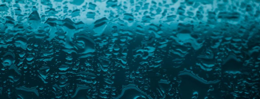 Liquid, wet and zen concept - Water texture abstract background, aqua drops on turquoise glass as science macro element, rainy weather and nature surface art backdrop for environmental brand design