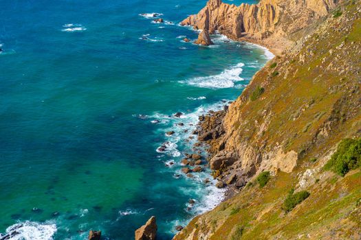 Atlantic ocean view with cliff. View of Atlantic Coast at Portugal, Cabo da Roca. Summer day. Seaside. Coastline. Beautiful landscape