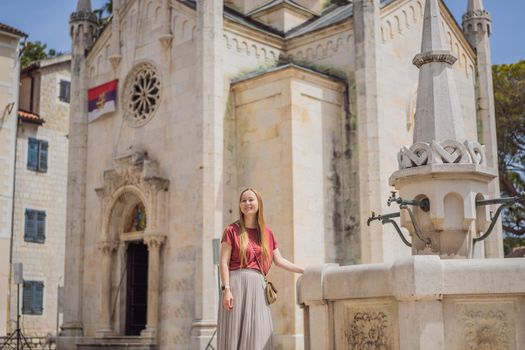 Woman tourist in Herceg Novi old town. Historical and touristic center of Herceg Novi. Montenegro.