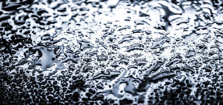 Liquid, wet and zen concept - Water texture abstract background, aqua drops on silver glass as science macro element, rainy weather and nature surface art backdrop for environmental brand design