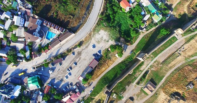 Aerial view of the streets of the city and the walls of the Genoese fortress. Sudak, Crimea