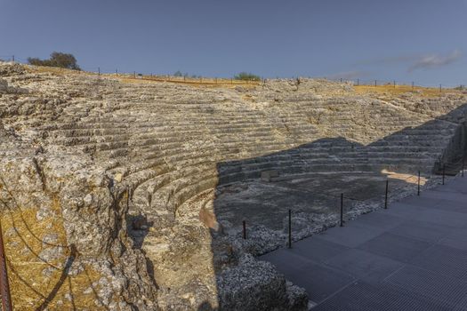 view of the remains of the roman amphitheater of acinipo in Ronda, Malaga.