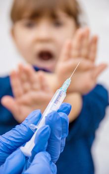 vaccination of children. An injection. Selective focus.