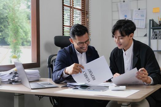 Two Business working at office with documents on desk, meeting to planning analyzing the financial report, business plan investment, finance analysis concept.