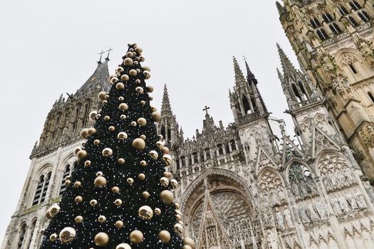 Decorated Christmas tree and cathedral at Rouen