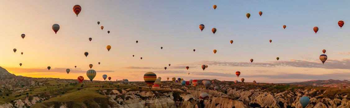 Sunrise with hot air balloons in Cappadocia, Turkey balloons in Cappadocia Goreme Kapadokya, and Sunrise in the mountains of Cappadocia.