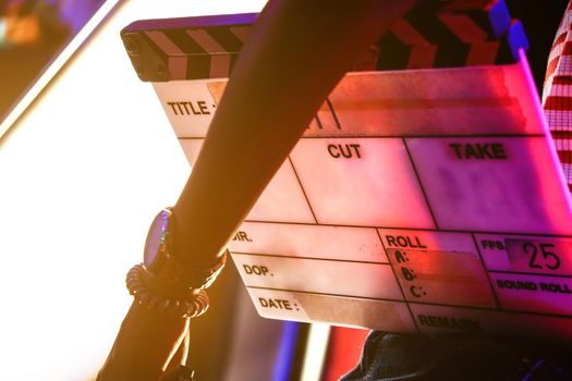 Film production crew, close up of movie Clapper board