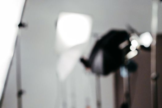 Abstract blurred background of studio lighting equipment on the set, behind the scenes