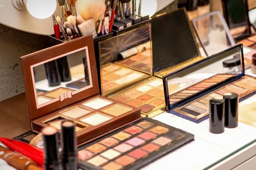 Set of decorative cosmetics on the table in a beauty salon